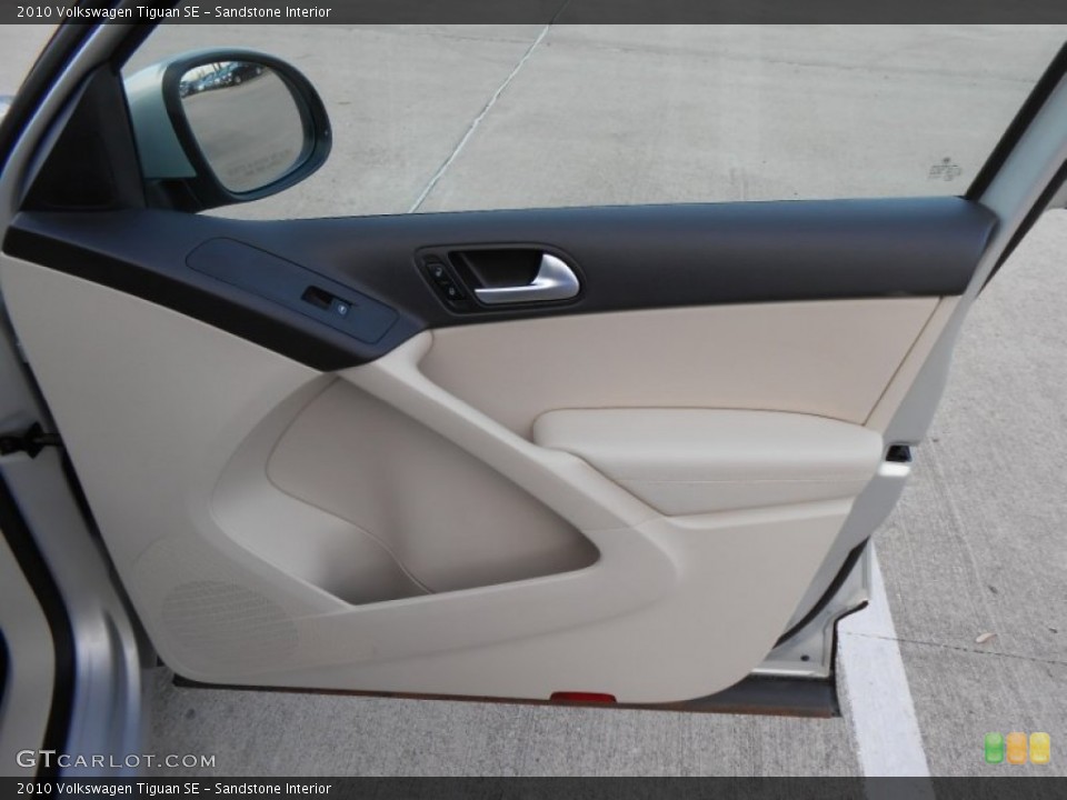 Sandstone Interior Door Panel for the 2010 Volkswagen Tiguan SE #76697258