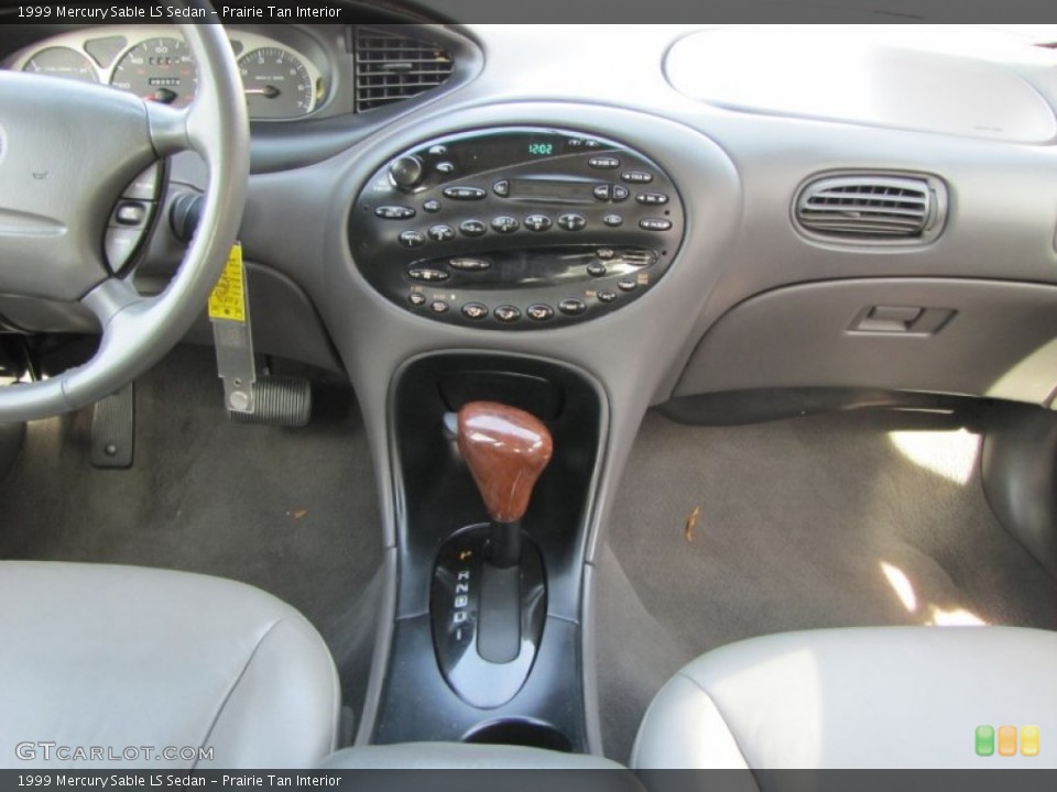 Prairie Tan Interior Dashboard for the 1999 Mercury Sable LS Sedan #76708222