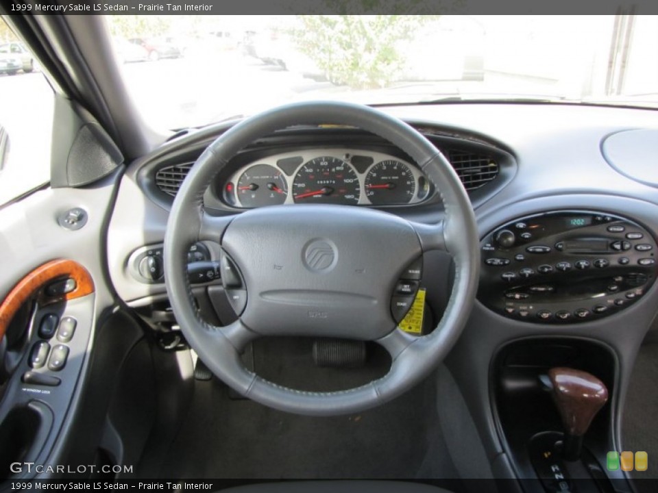 Prairie Tan Interior Dashboard for the 1999 Mercury Sable LS Sedan #76708276