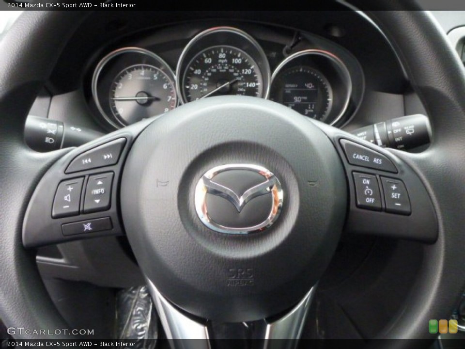 Black Interior Steering Wheel for the 2014 Mazda CX-5 Sport AWD #76733437