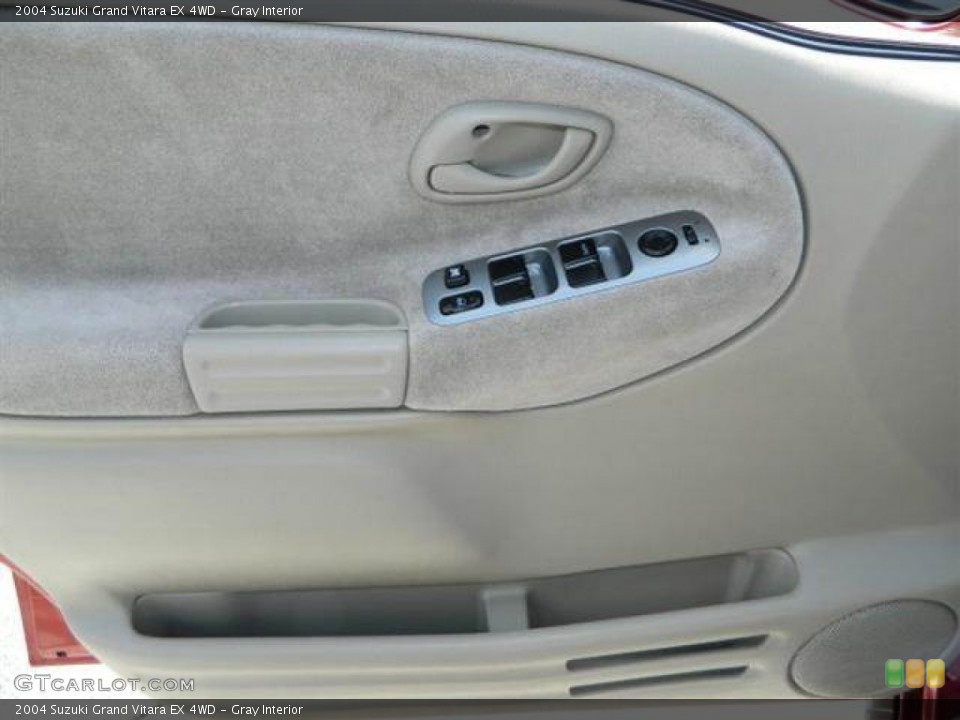 Gray Interior Door Panel for the 2004 Suzuki Grand Vitara EX 4WD #76748698