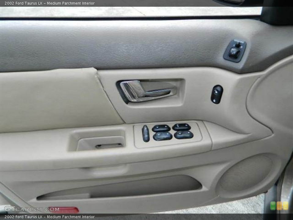 Medium Parchment Interior Door Panel for the 2002 Ford Taurus LX #76752712