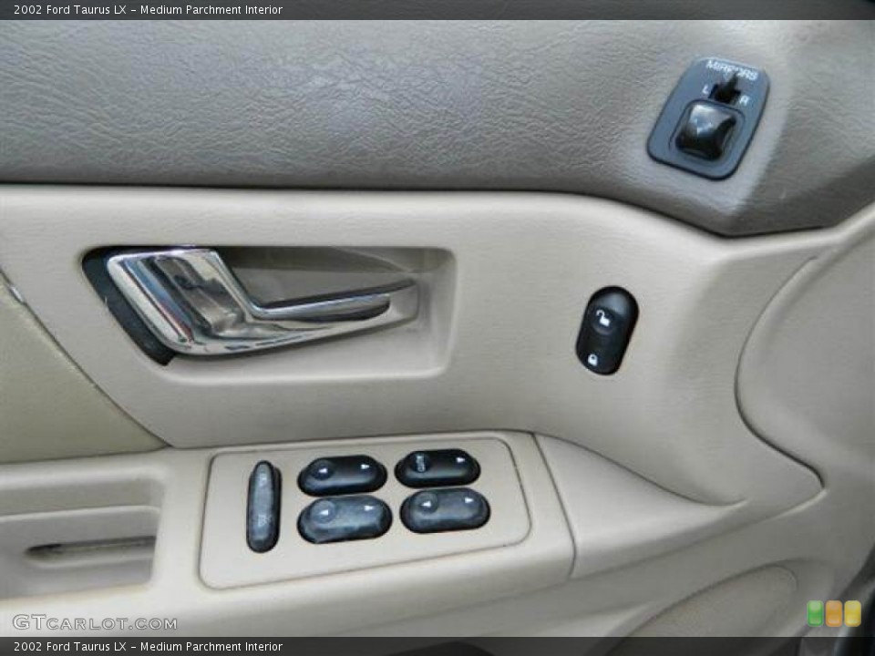 Medium Parchment Interior Controls for the 2002 Ford Taurus LX #76752728