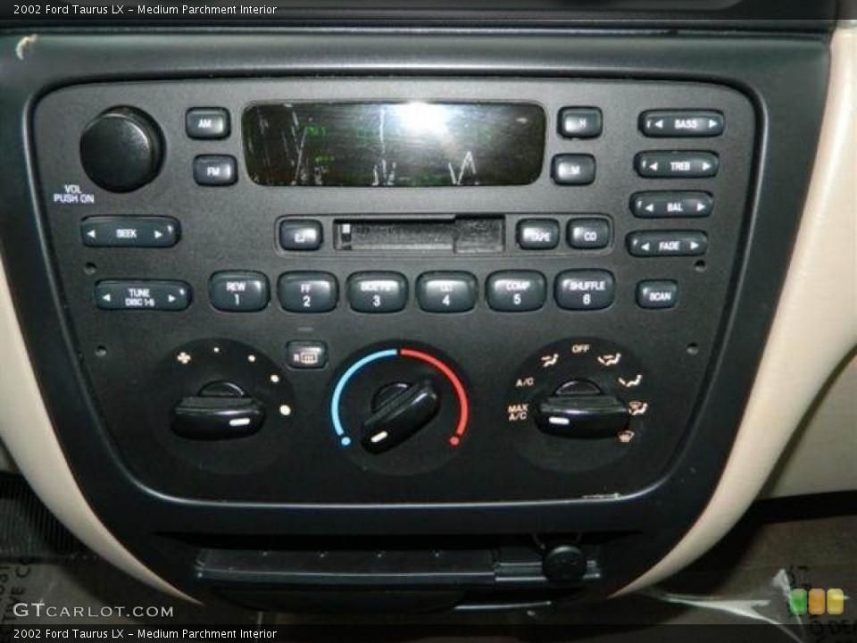 Medium Parchment Interior Controls for the 2002 Ford Taurus LX #76752767