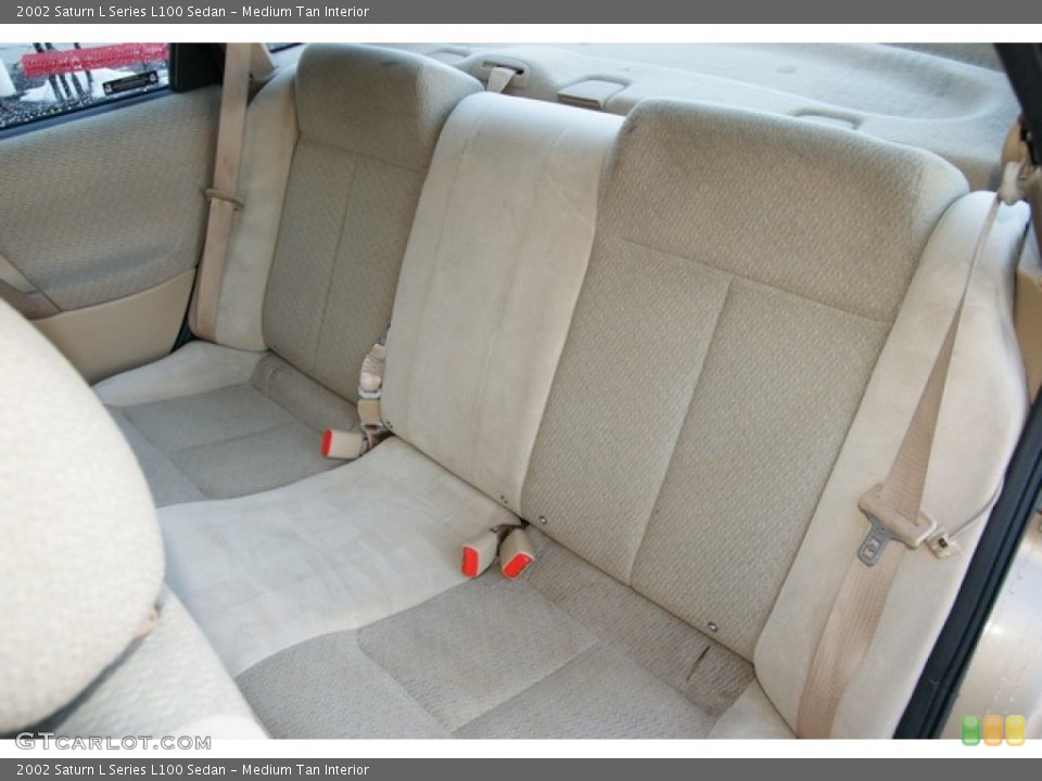Medium Tan Interior Rear Seat for the 2002 Saturn L Series L100 Sedan #76763378