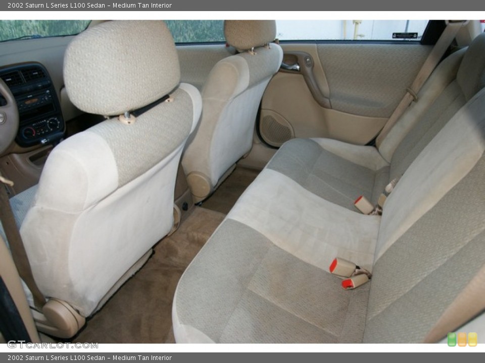 Medium Tan Interior Rear Seat for the 2002 Saturn L Series L100 Sedan #76763477