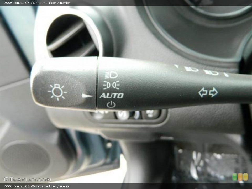 Ebony Interior Controls for the 2006 Pontiac G6 V6 Sedan #76765170
