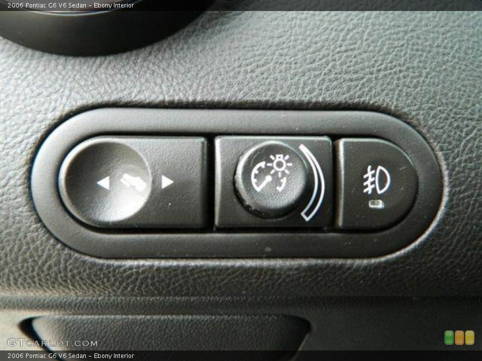 Ebony Interior Controls for the 2006 Pontiac G6 V6 Sedan #76765196