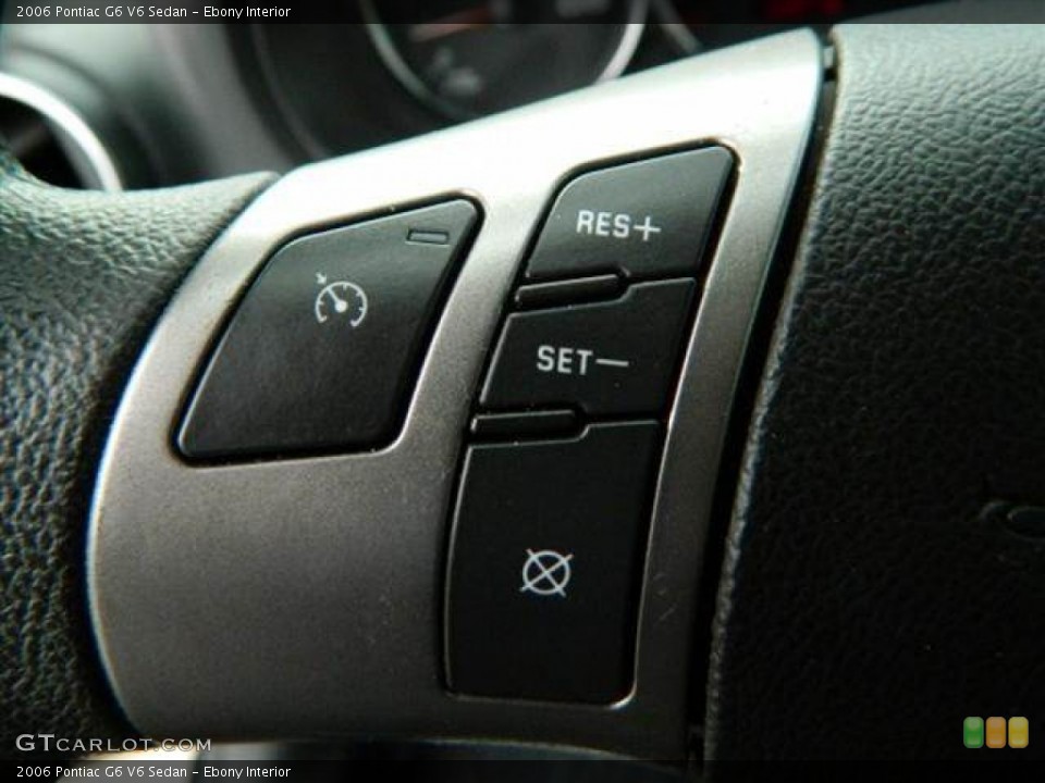 Ebony Interior Controls for the 2006 Pontiac G6 V6 Sedan #76765208