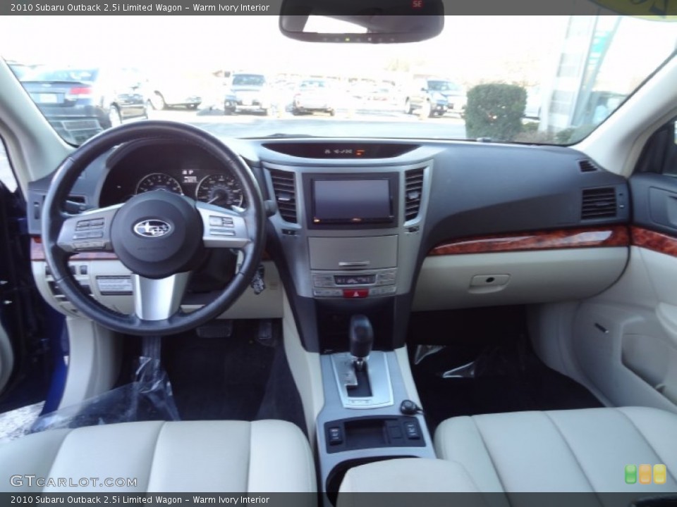 Warm Ivory Interior Dashboard for the 2010 Subaru Outback 2.5i Limited Wagon #76786529