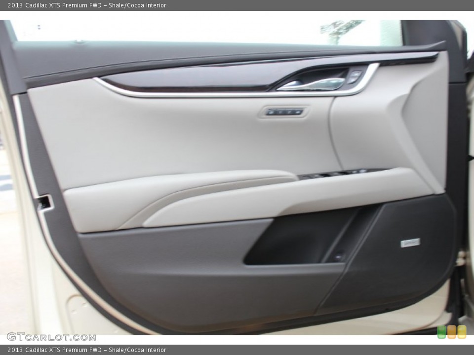 Shale/Cocoa Interior Door Panel for the 2013 Cadillac XTS Premium FWD #76824441