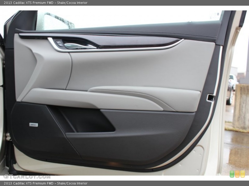 Shale/Cocoa Interior Door Panel for the 2013 Cadillac XTS Premium FWD #76824490