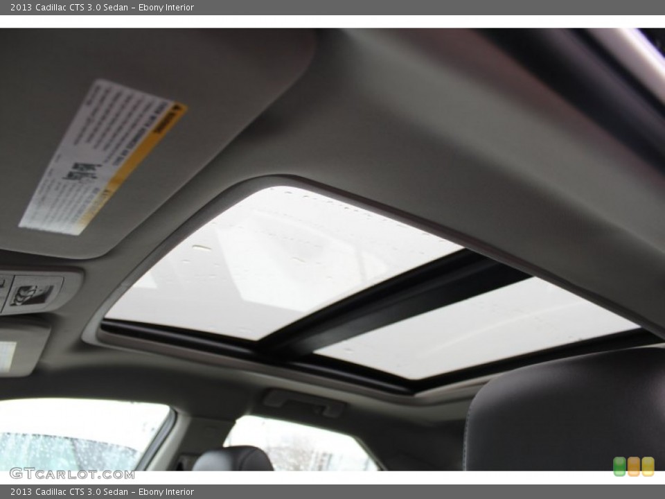 Ebony Interior Sunroof for the 2013 Cadillac CTS 3.0 Sedan #76825191