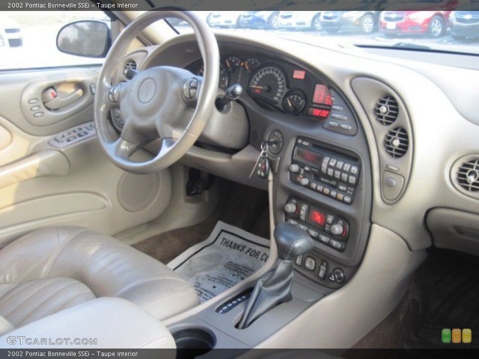 Taupe Interior Dashboard for the 2002 Pontiac Bonneville SSEi #76875969