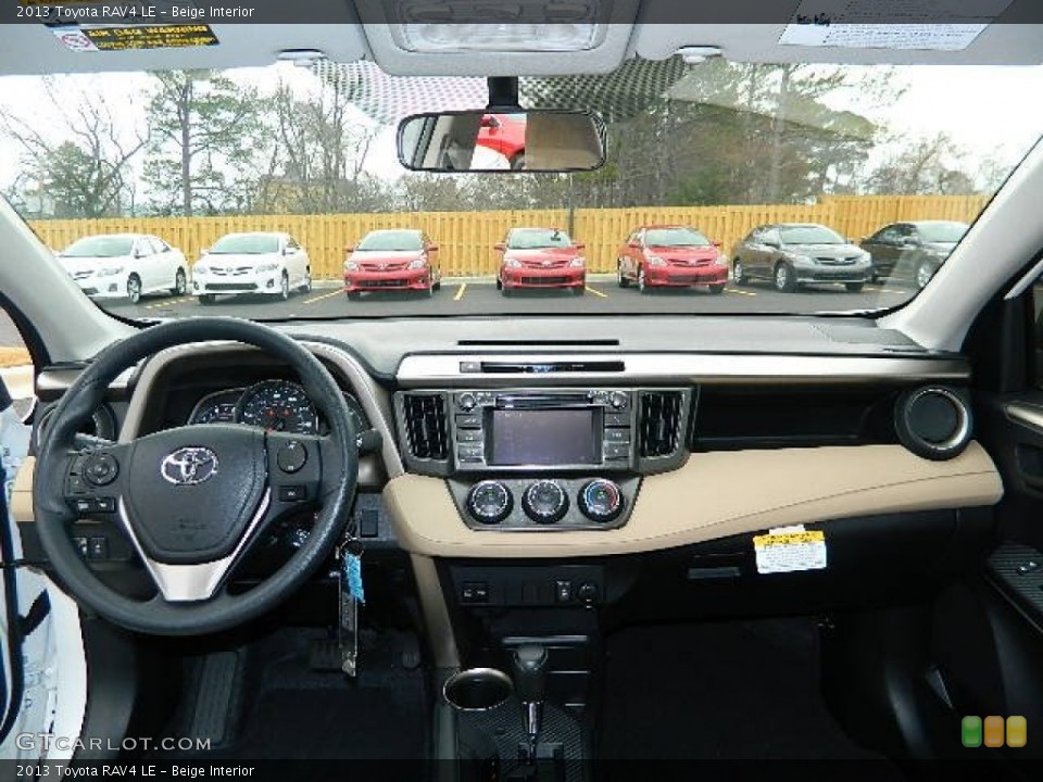 Beige Interior Dashboard for the 2013 Toyota RAV4 LE #76878106