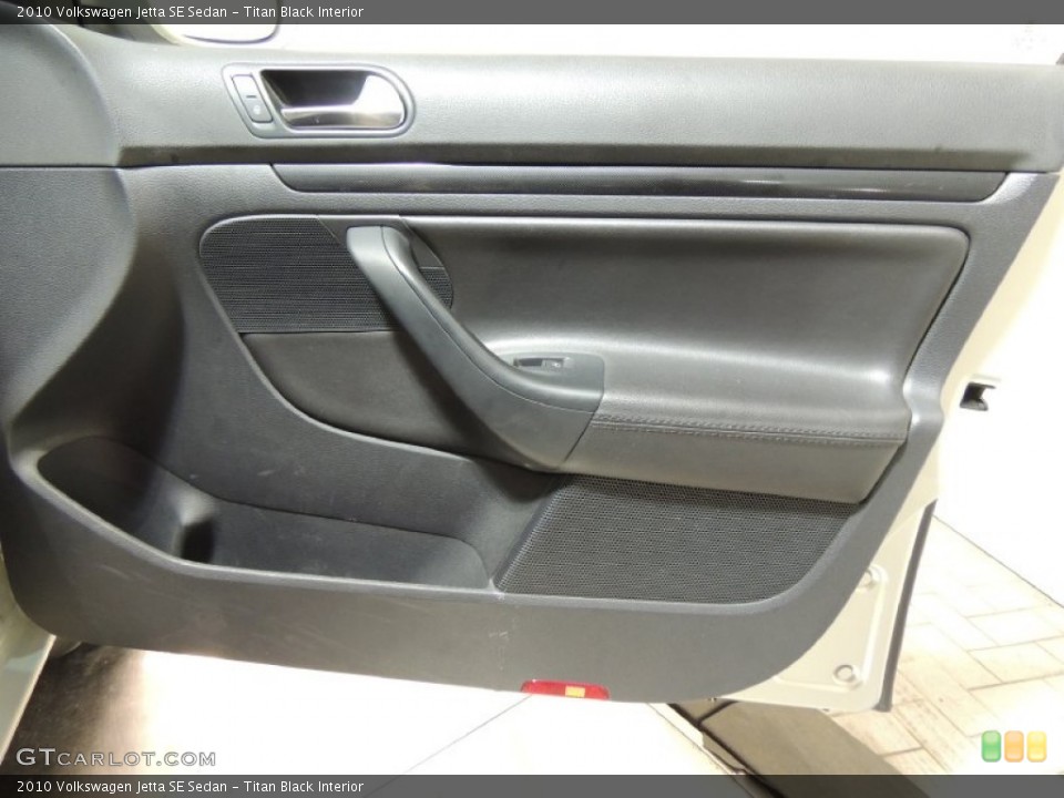 Titan Black Interior Door Panel for the 2010 Volkswagen Jetta SE Sedan #76895700