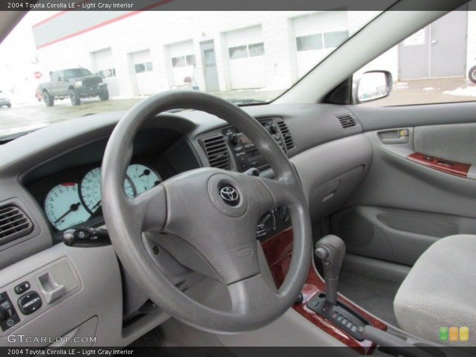 Light Gray Interior Dashboard for the 2004 Toyota Corolla LE #76906203