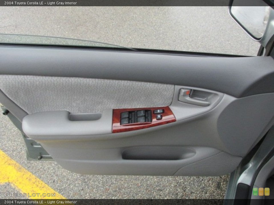 Light Gray Interior Door Panel for the 2004 Toyota Corolla LE #76906225