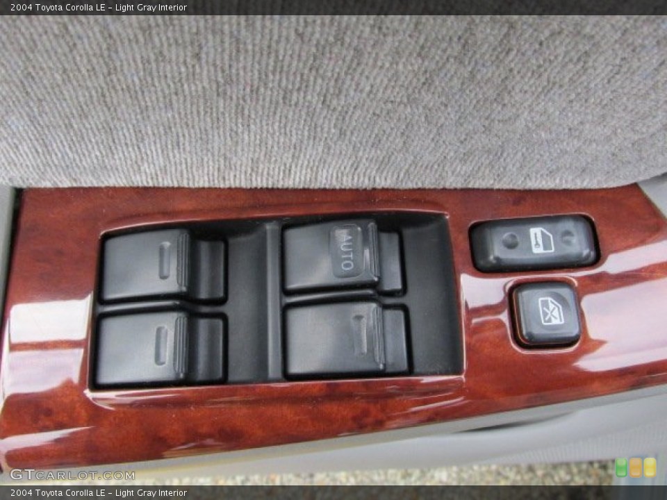 Light Gray Interior Controls for the 2004 Toyota Corolla LE #76906245