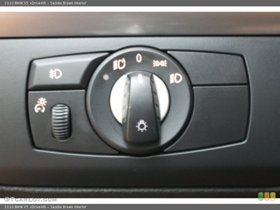 Saddle Brown Interior Controls for the 2010 BMW X5 xDrive48i #76918851