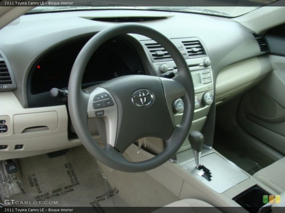Bisque Interior Dashboard for the 2011 Toyota Camry LE #76941774