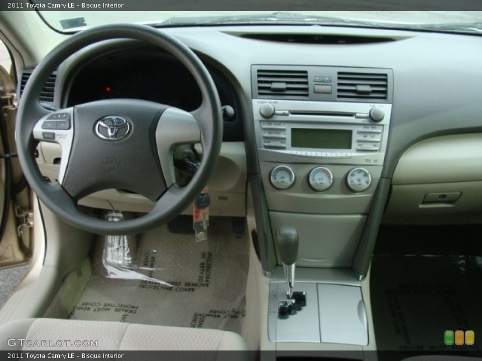 Bisque Interior Dashboard for the 2011 Toyota Camry LE #76941790