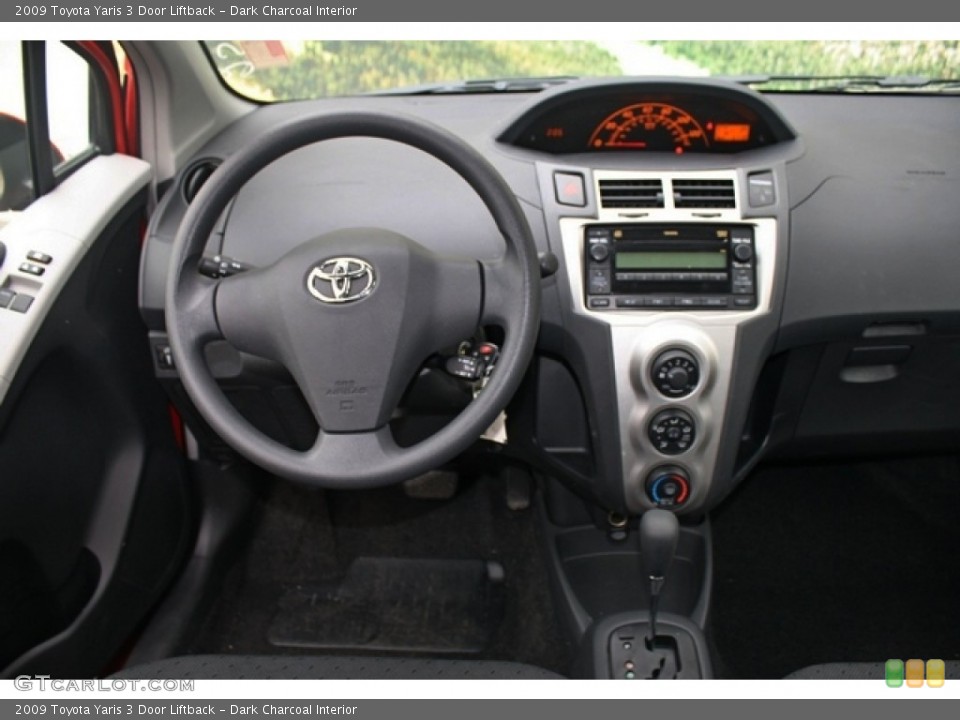 Dark Charcoal Interior Dashboard for the 2009 Toyota Yaris 3 Door Liftback #76962289