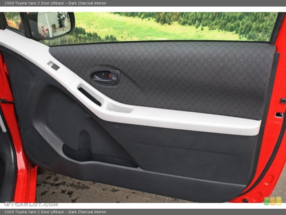 Dark Charcoal Interior Door Panel for the 2009 Toyota Yaris 3 Door Liftback #76962532