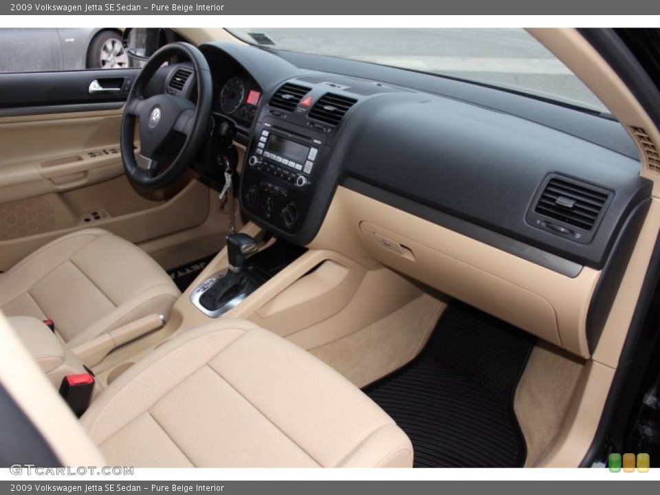 Pure Beige Interior Dashboard for the 2009 Volkswagen Jetta SE Sedan #76970882