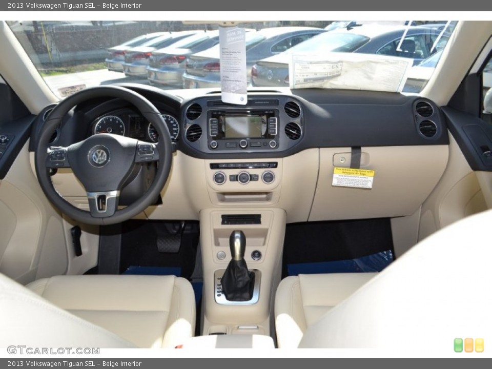 Beige Interior Dashboard for the 2013 Volkswagen Tiguan SEL #76988190