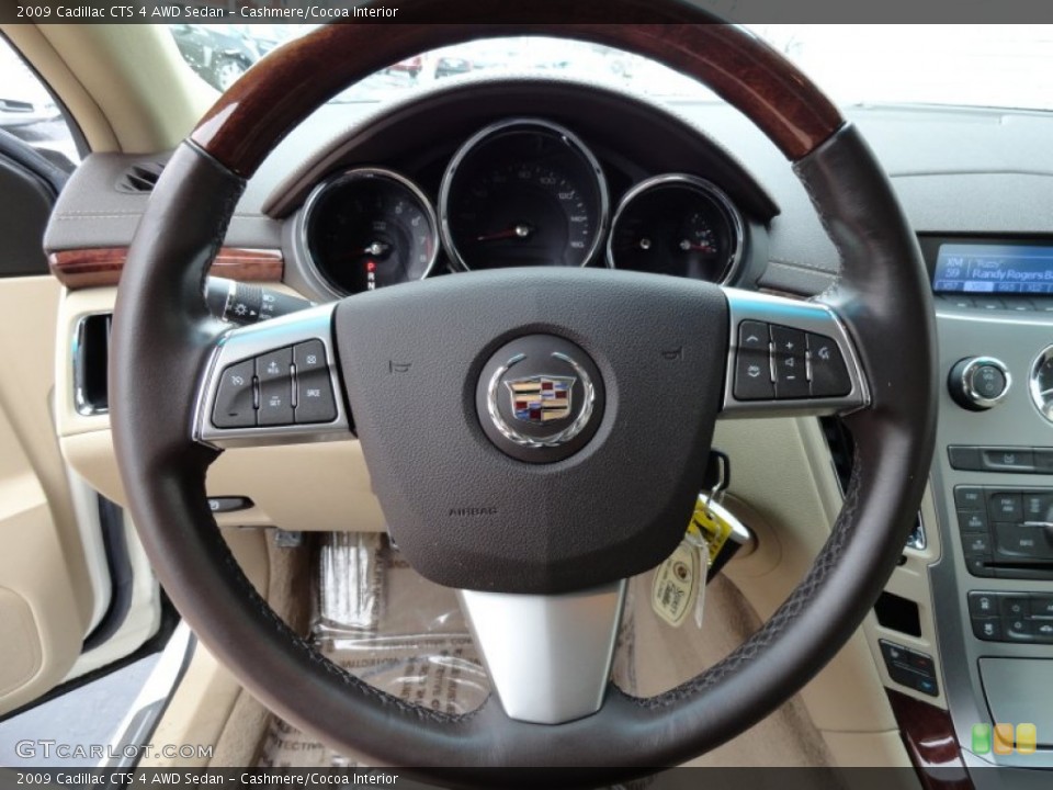 Cashmere/Cocoa Interior Steering Wheel for the 2009 Cadillac CTS 4 AWD Sedan #76992027