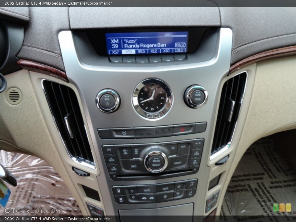 Cashmere/Cocoa Interior Controls for the 2009 Cadillac CTS 4 AWD Sedan #76992054