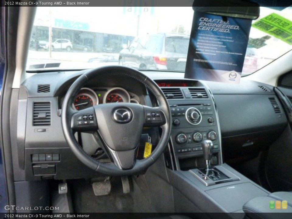 Black Interior Dashboard for the 2012 Mazda CX-9 Touring AWD #76994808