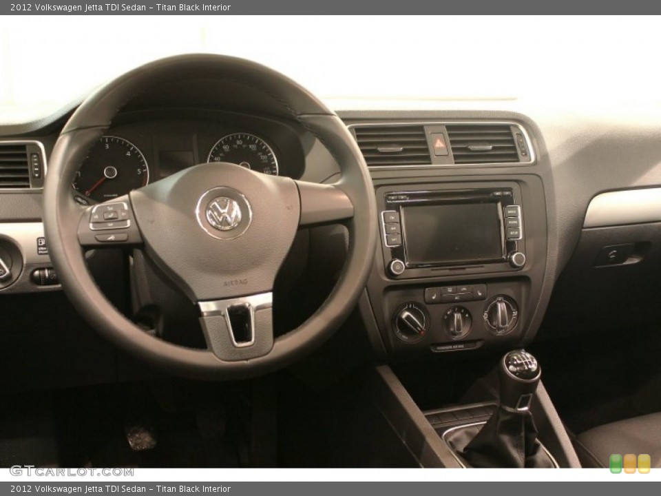 Titan Black Interior Dashboard for the 2012 Volkswagen Jetta TDI Sedan #76999394