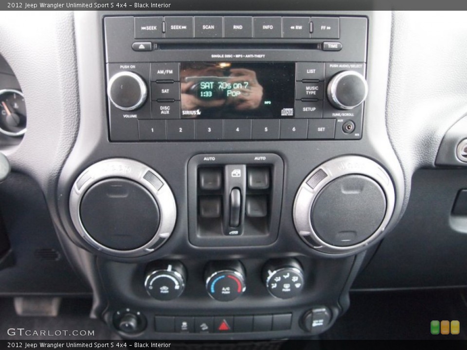 Black Interior Controls for the 2012 Jeep Wrangler Unlimited Sport S 4x4 #77002176