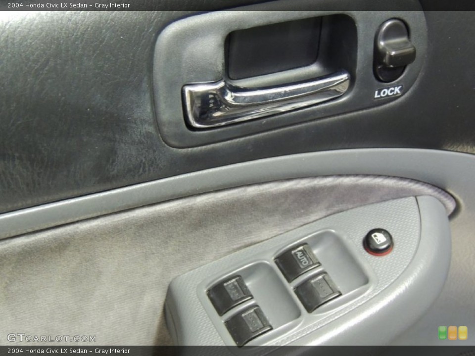Gray Interior Controls for the 2004 Honda Civic LX Sedan #77009319