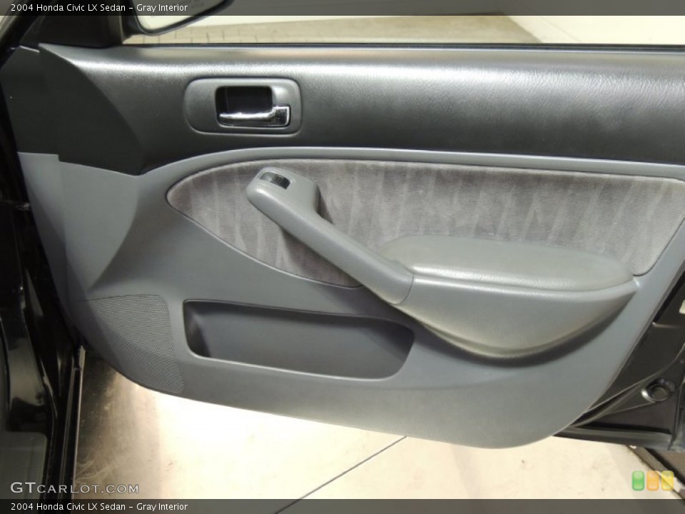 Gray Interior Door Panel for the 2004 Honda Civic LX Sedan #77009577