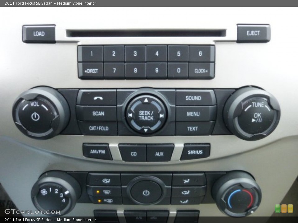 Medium Stone Interior Controls for the 2011 Ford Focus SE Sedan #77033316