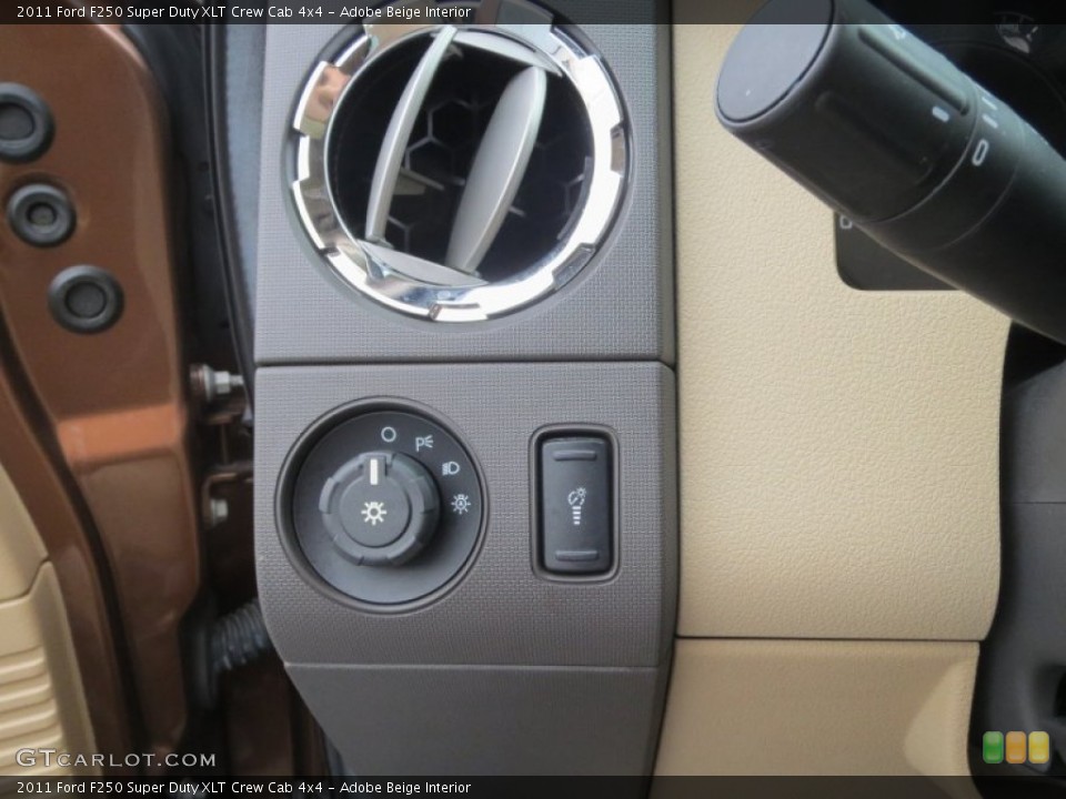Adobe Beige Interior Controls for the 2011 Ford F250 Super Duty XLT Crew Cab 4x4 #77034687