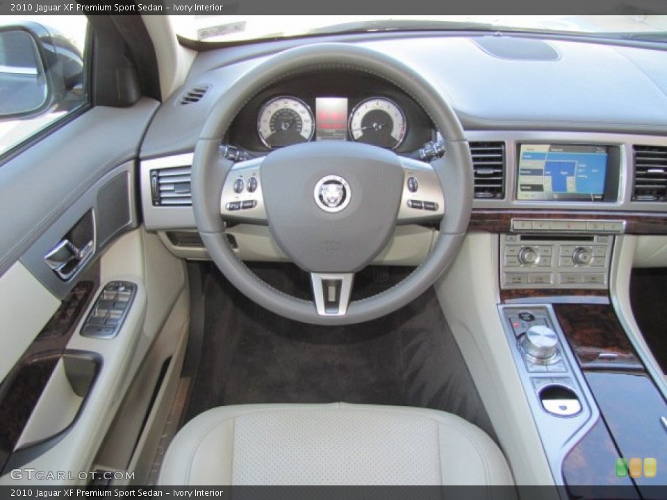 Ivory Interior Dashboard for the 2010 Jaguar XF Premium Sport Sedan #77039448