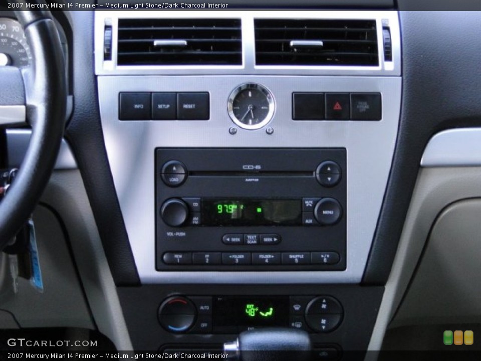 Medium Light Stone/Dark Charcoal Interior Controls for the 2007 Mercury Milan I4 Premier #77040384