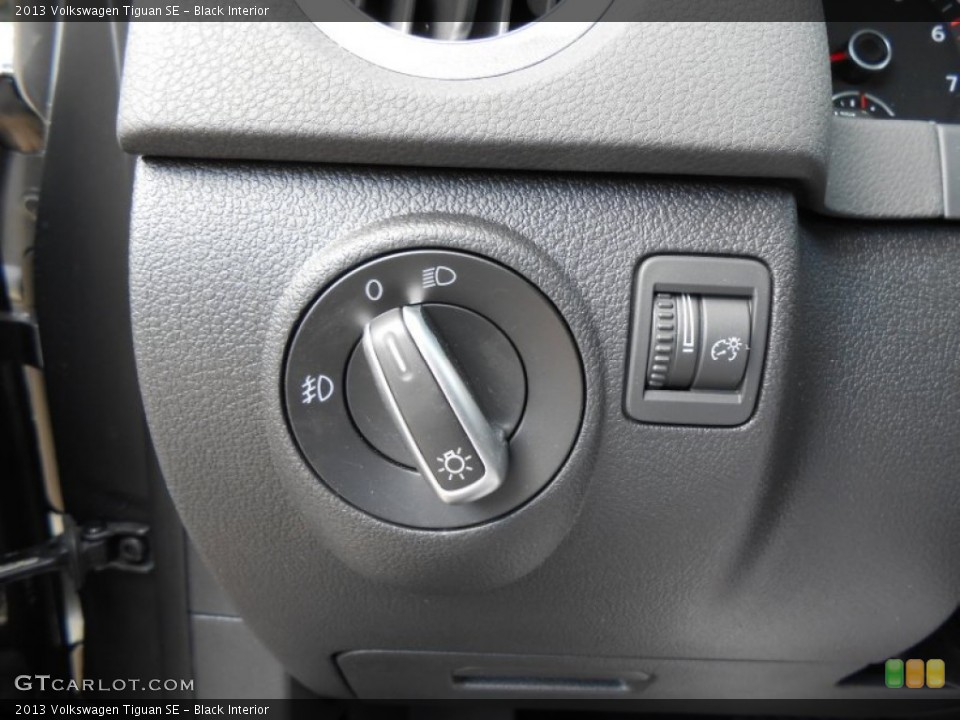 Black Interior Controls for the 2013 Volkswagen Tiguan SE #77090102