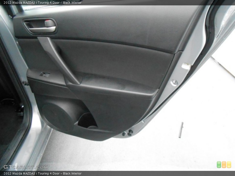 Black Interior Door Panel for the 2012 Mazda MAZDA3 i Touring 4 Door #77099914