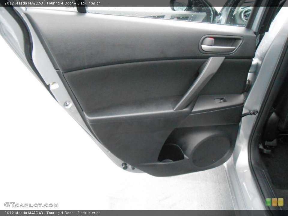 Black Interior Door Panel for the 2012 Mazda MAZDA3 i Touring 4 Door #77099960