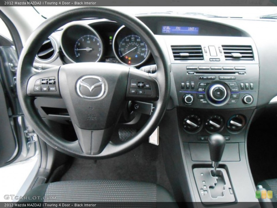Black Interior Dashboard for the 2012 Mazda MAZDA3 i Touring 4 Door #77100054
