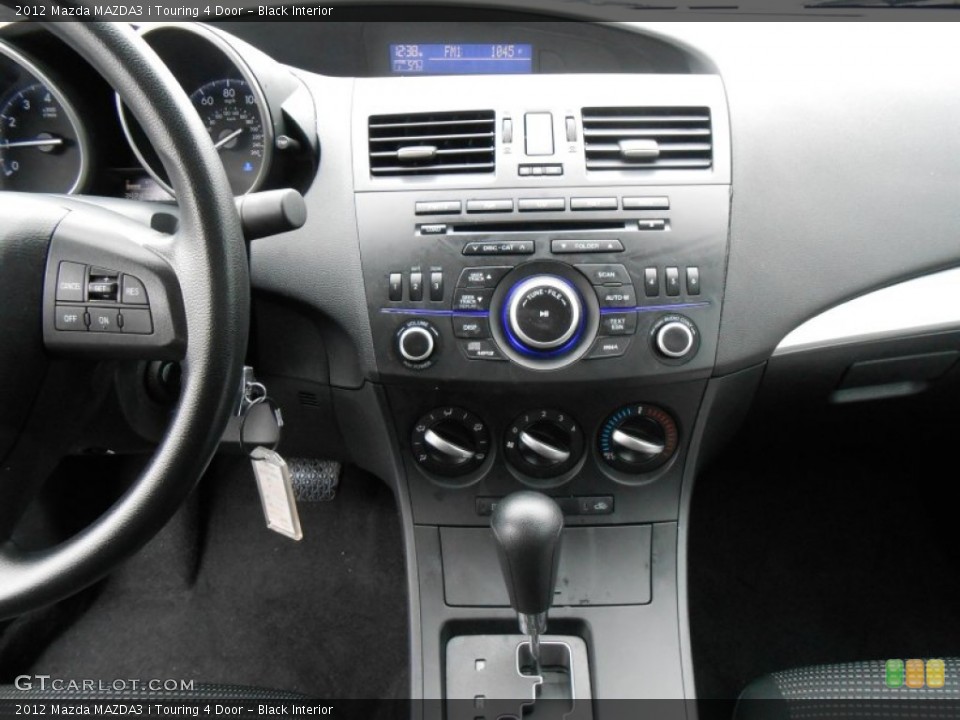 Black Interior Controls for the 2012 Mazda MAZDA3 i Touring 4 Door #77100071