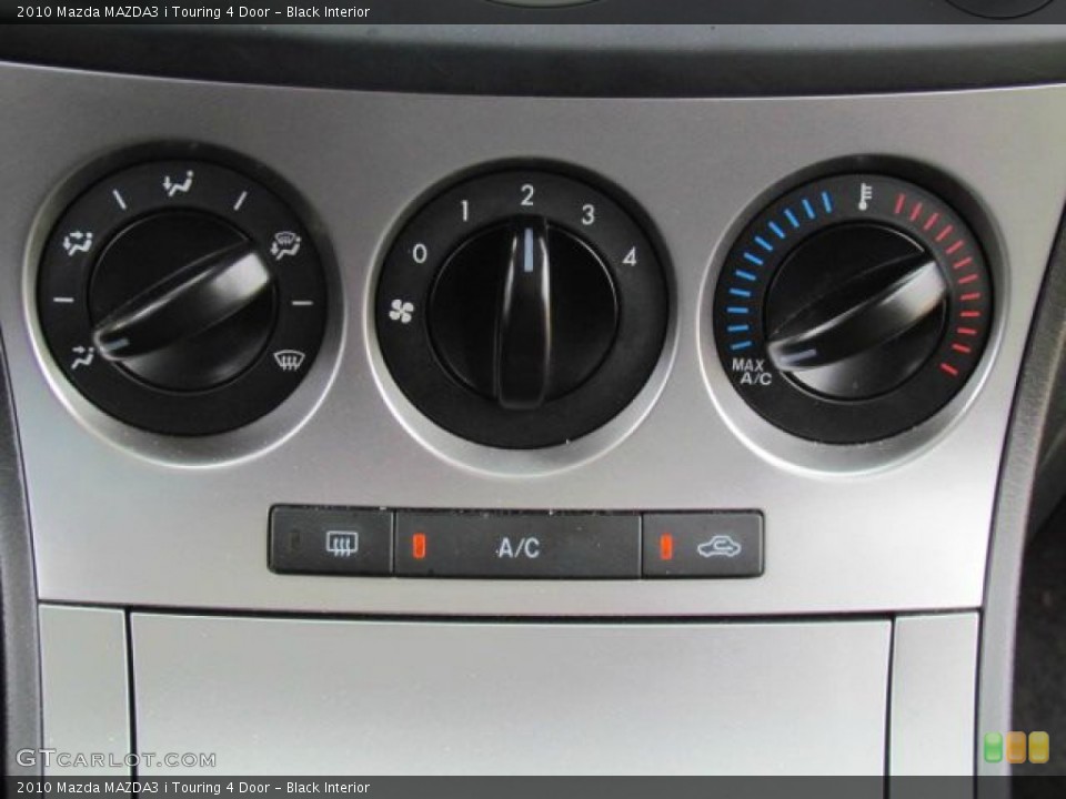 Black Interior Controls for the 2010 Mazda MAZDA3 i Touring 4 Door #77109744