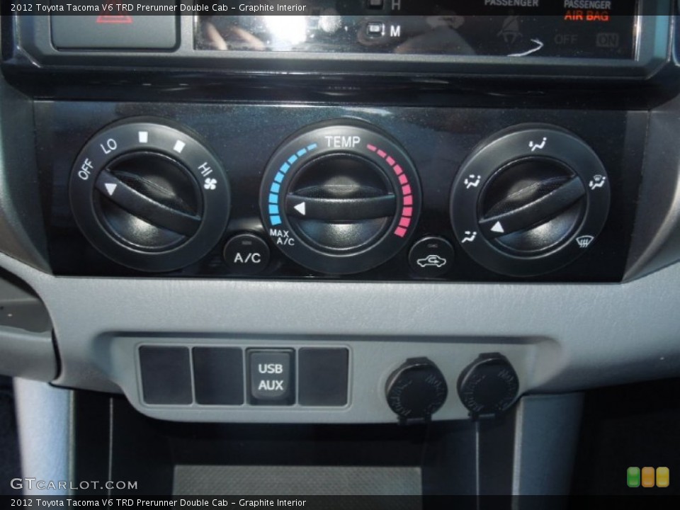 Graphite Interior Controls for the 2012 Toyota Tacoma V6 TRD Prerunner Double Cab #77115002