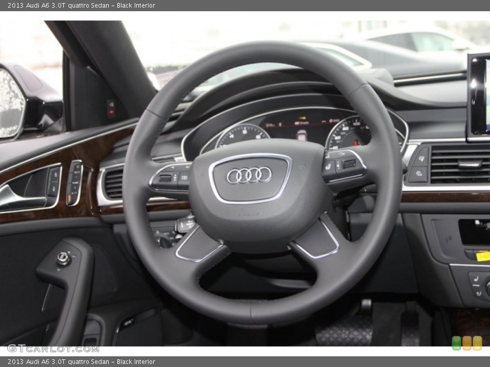 Black Interior Steering Wheel for the 2013 Audi A6 3.0T quattro Sedan #77120395