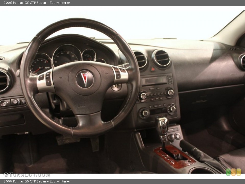 Ebony Interior Dashboard for the 2006 Pontiac G6 GTP Sedan #77123414